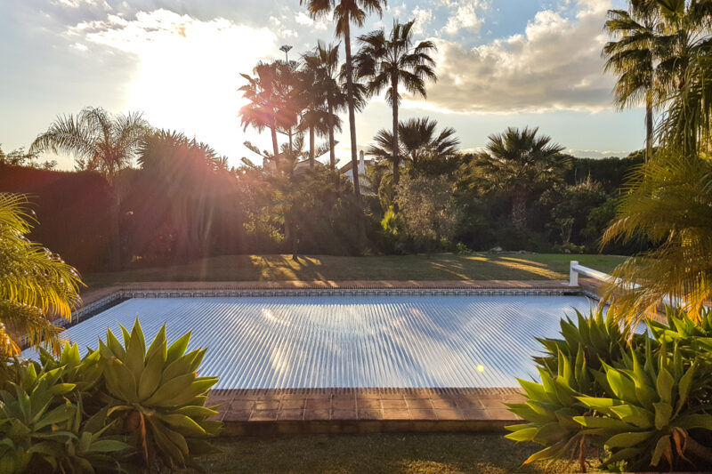 This is an automatic pool cover installed by ACAIR in Marbella, Costa del Sol