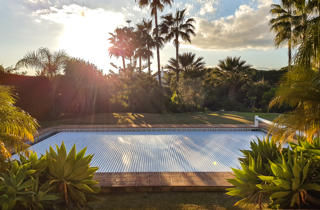 This is an automatic pool cover installed by ACAIR in Marbella, Costa del Sol